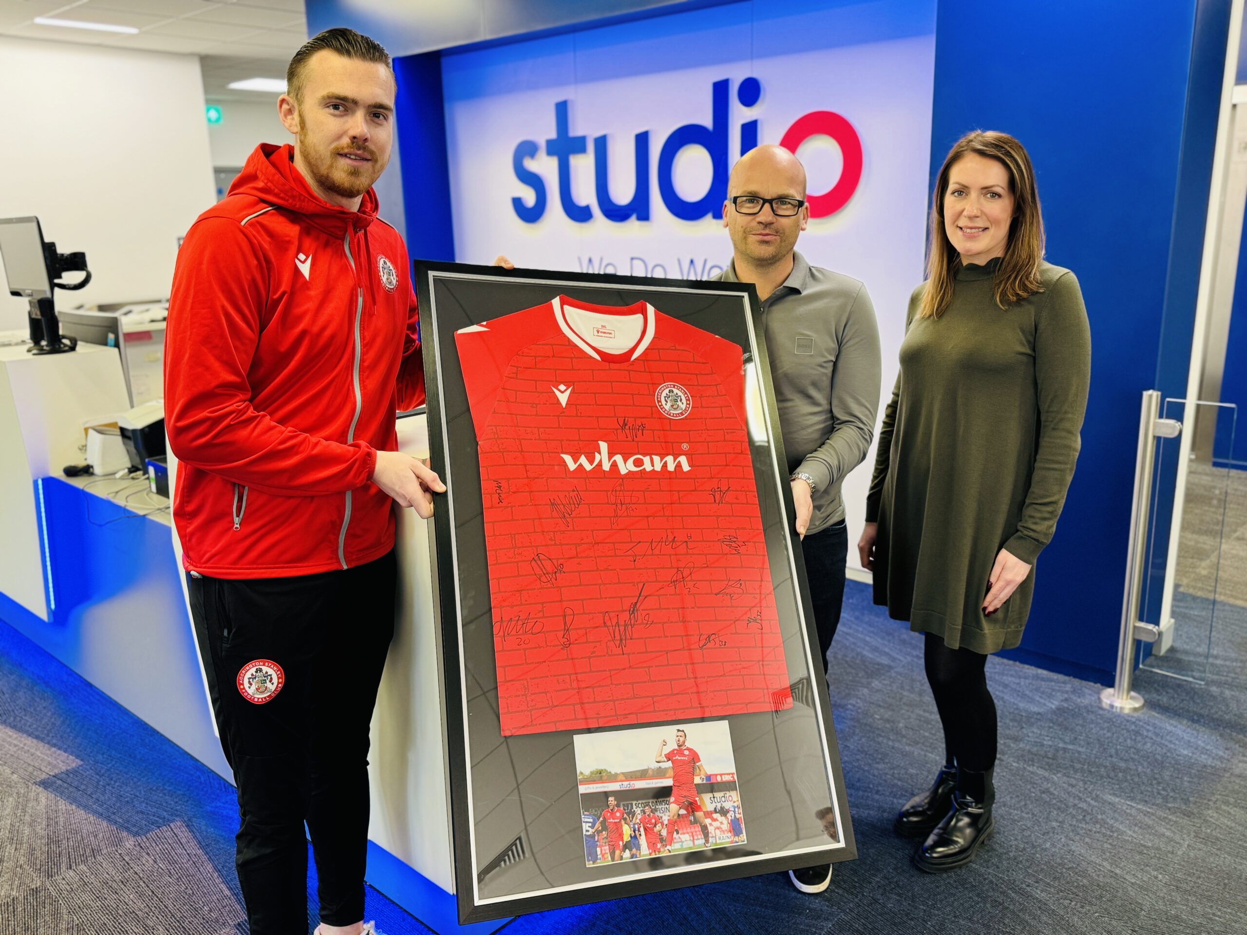 Accrington Stanley show gratitude to long serving sponsors Studio with special gift